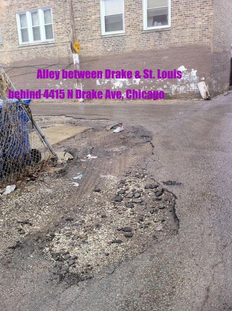 photo of alley pothole turned crater in Chicago